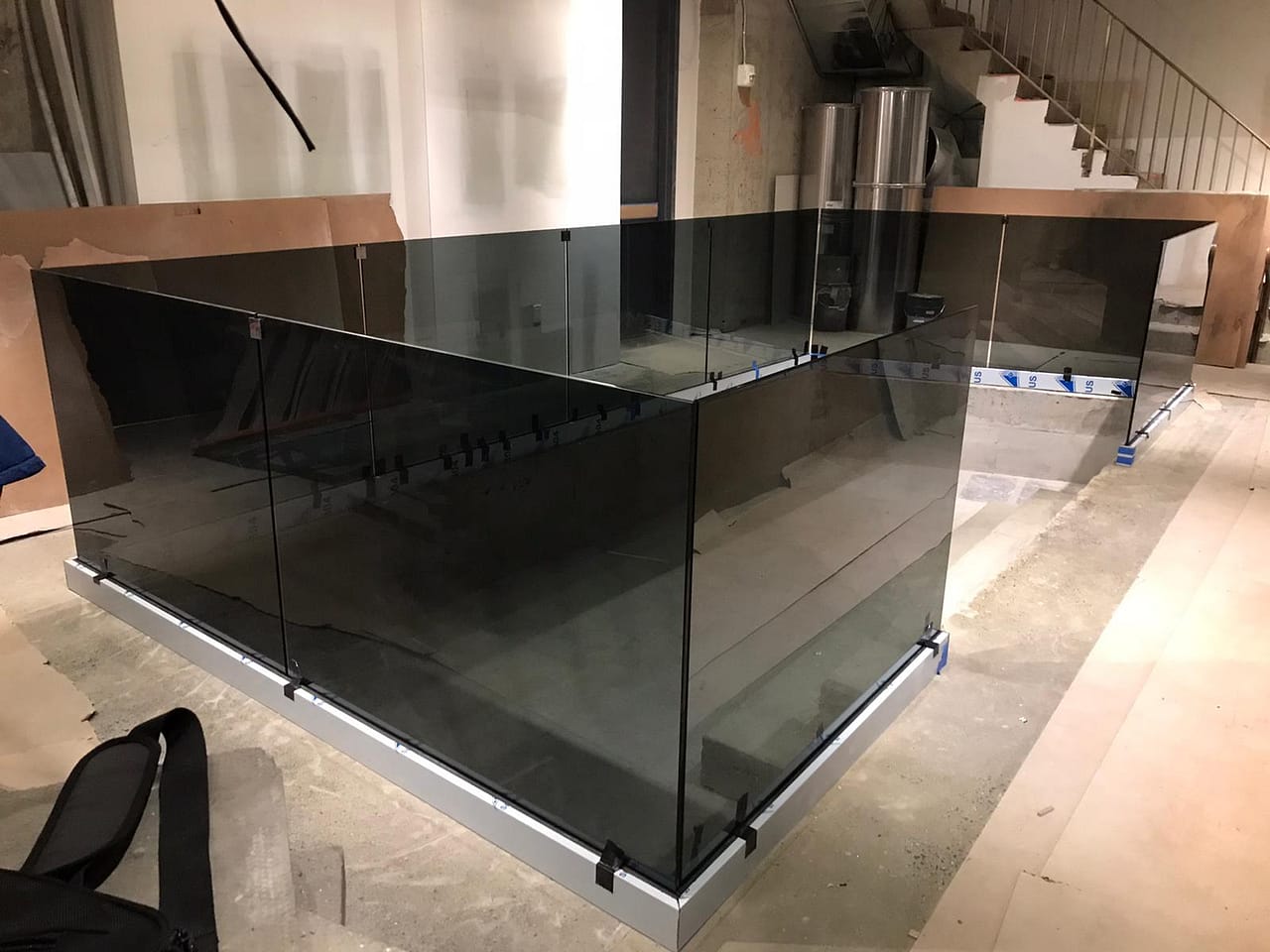 Black Glass stairs railing in New York